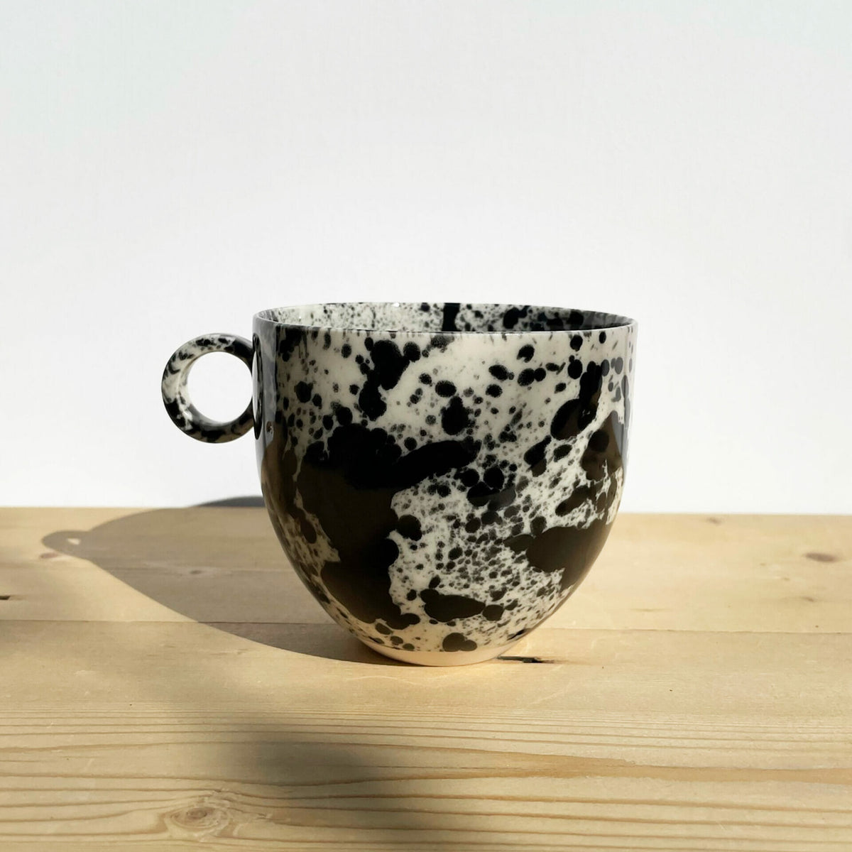 black-splatter-mug-ceramic-drips-cup-inky-drops-pottery