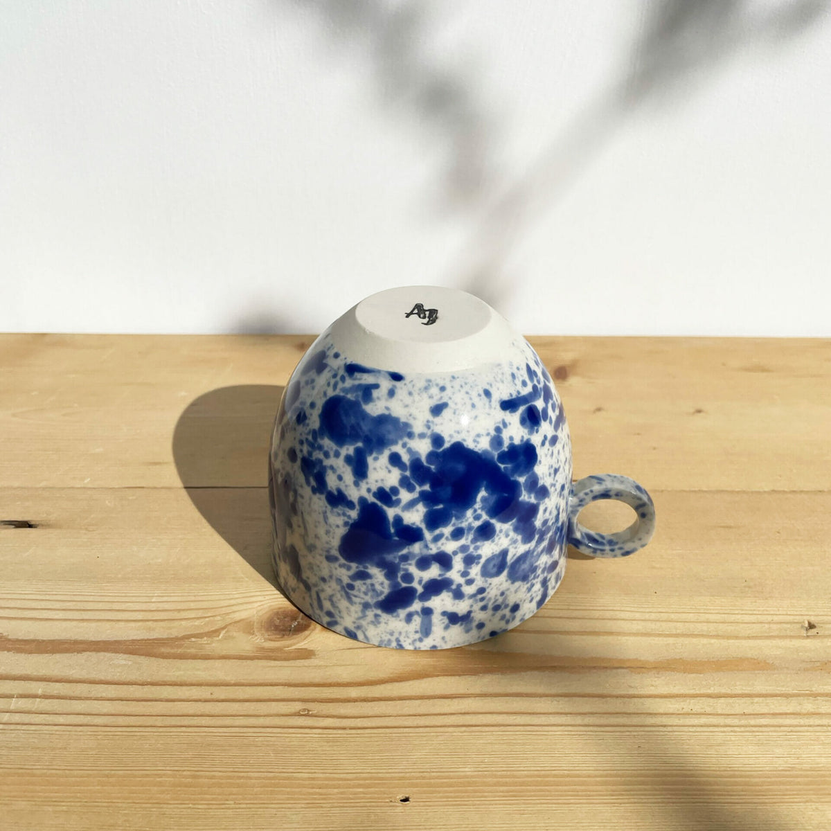 blue-splatter-mug-ceramic-paint-splashes-ink-navy-white