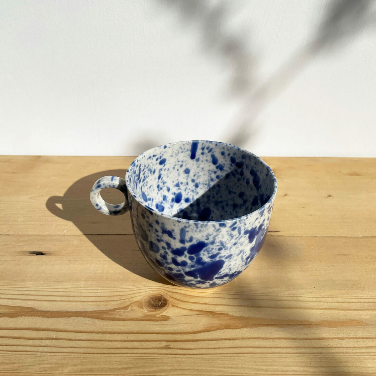 blue-splatter-mug-ceramic-paint-splashes-ink-navy-white
