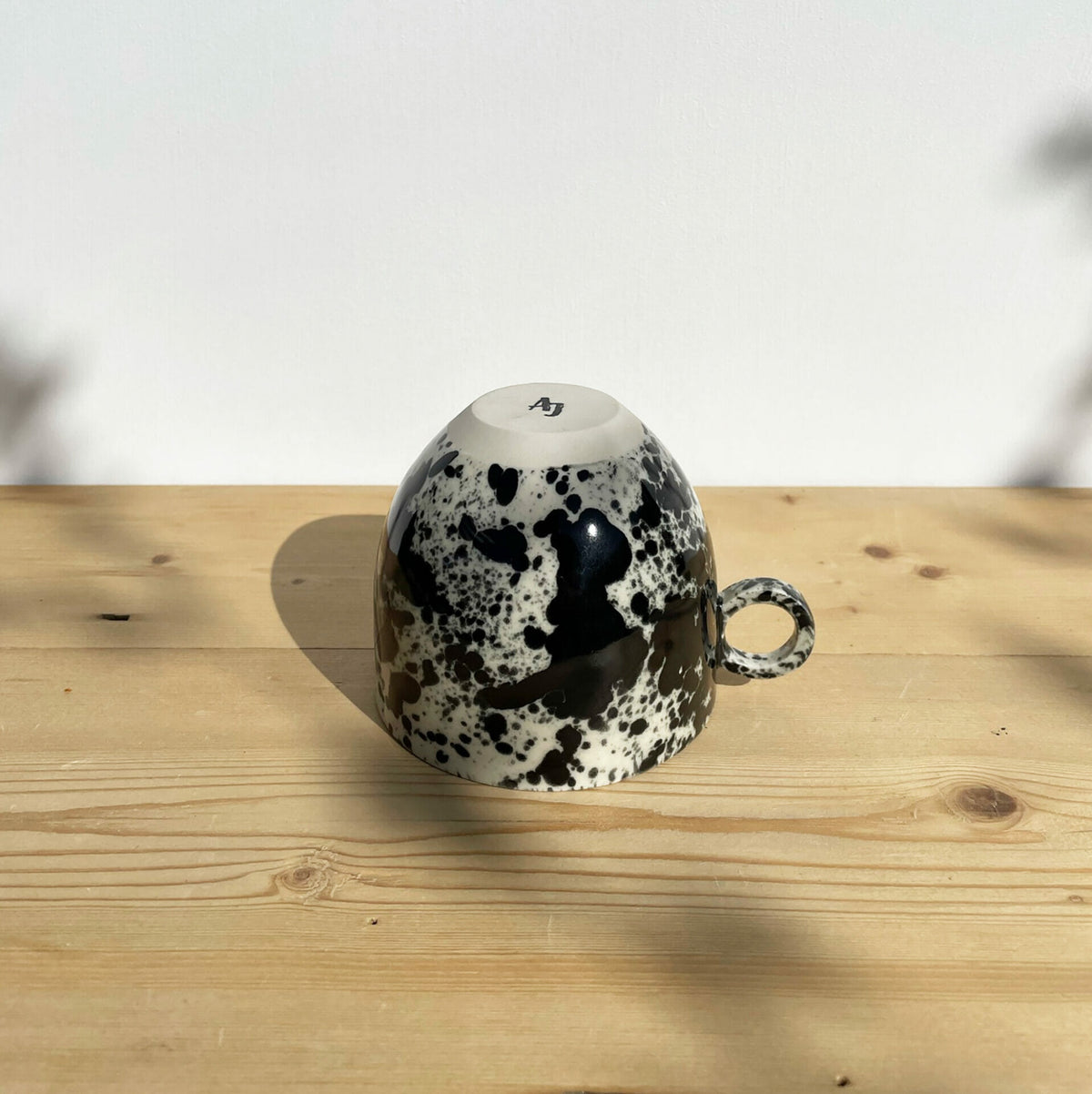black-splatter-mug-ceramic-drips-cup-inky-drops-pottery