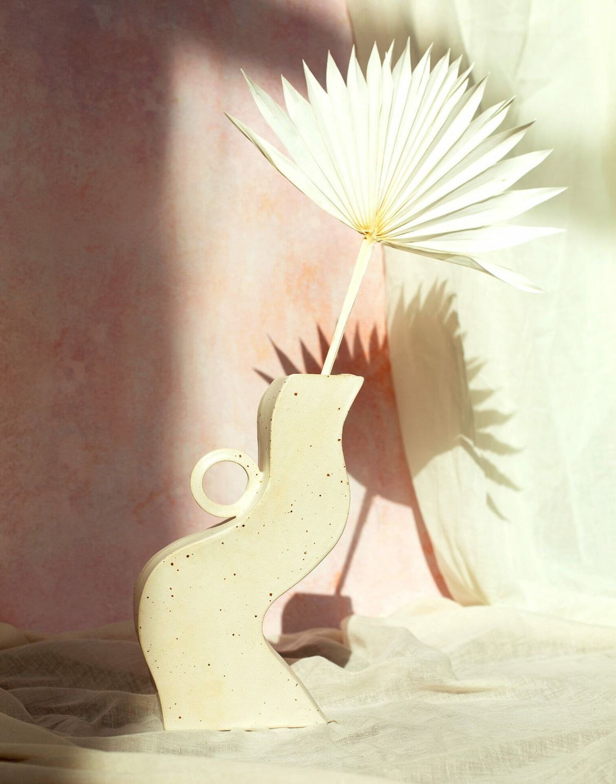cur-vase-ous-white-ceramic-handmade-pottery-curved-shape
