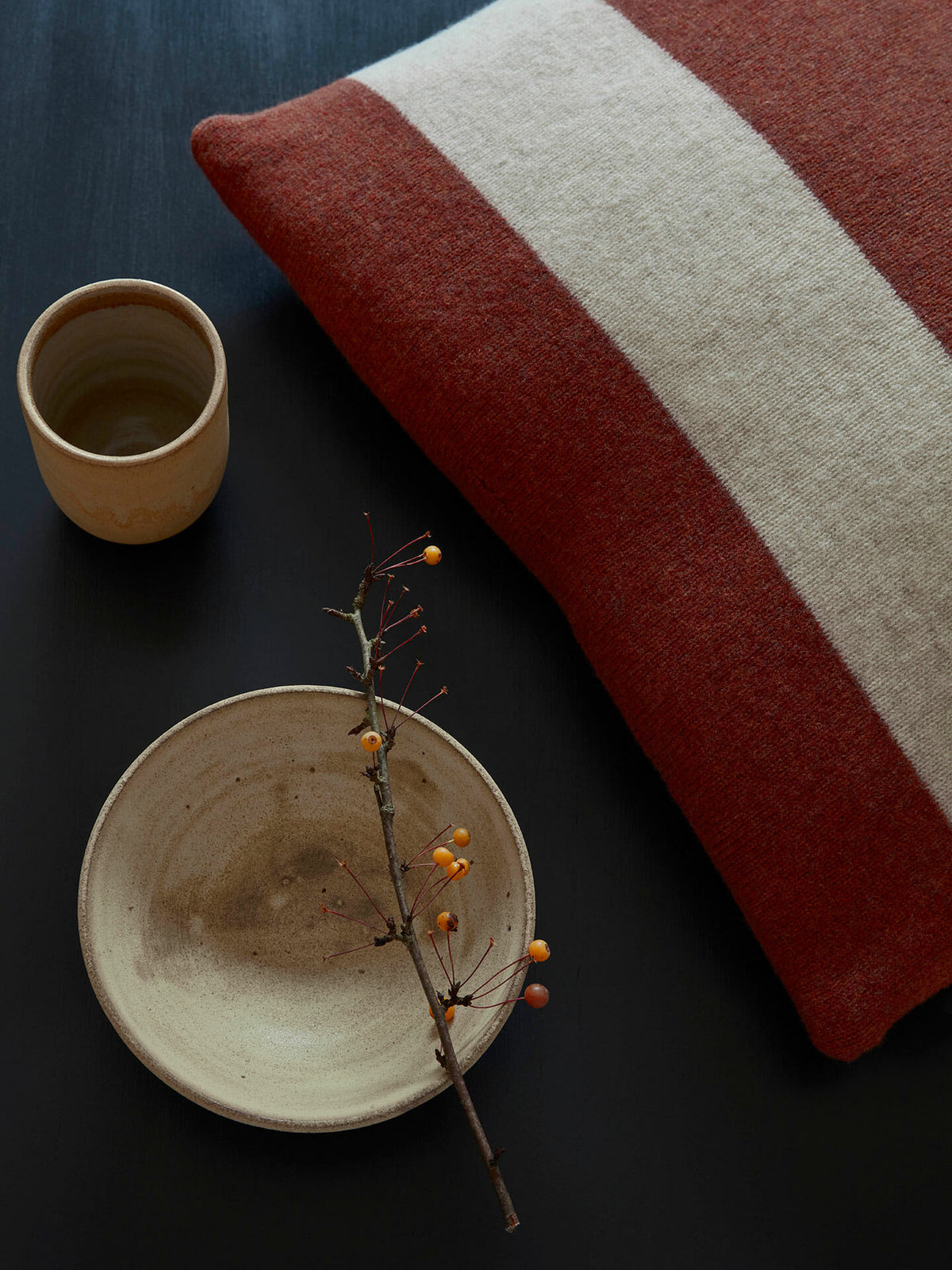 rust-three-stripe-cushion-and-ceramics