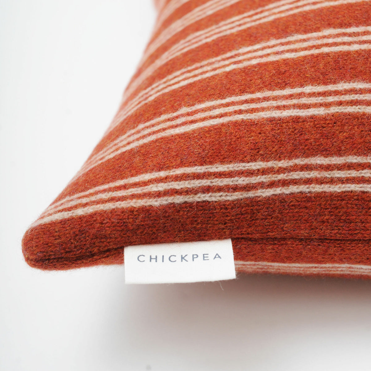 rust-ticking-stripe-cushion