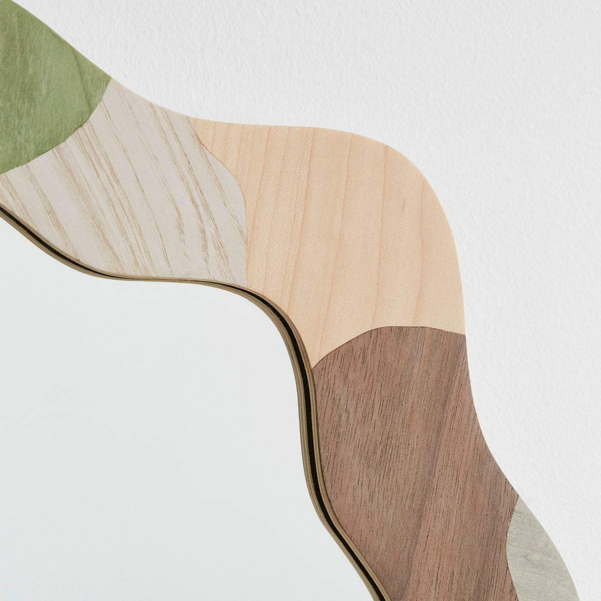 small-round-curved-mirror-marquetry-design-organic-shape
