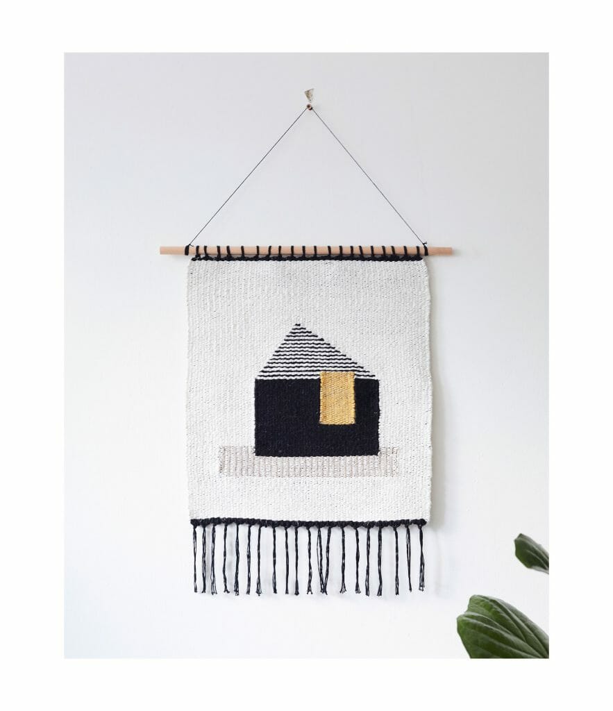 talo-wall-hanging -art-textiles-tapestry-black-mustard-house-white-backgroundwhite