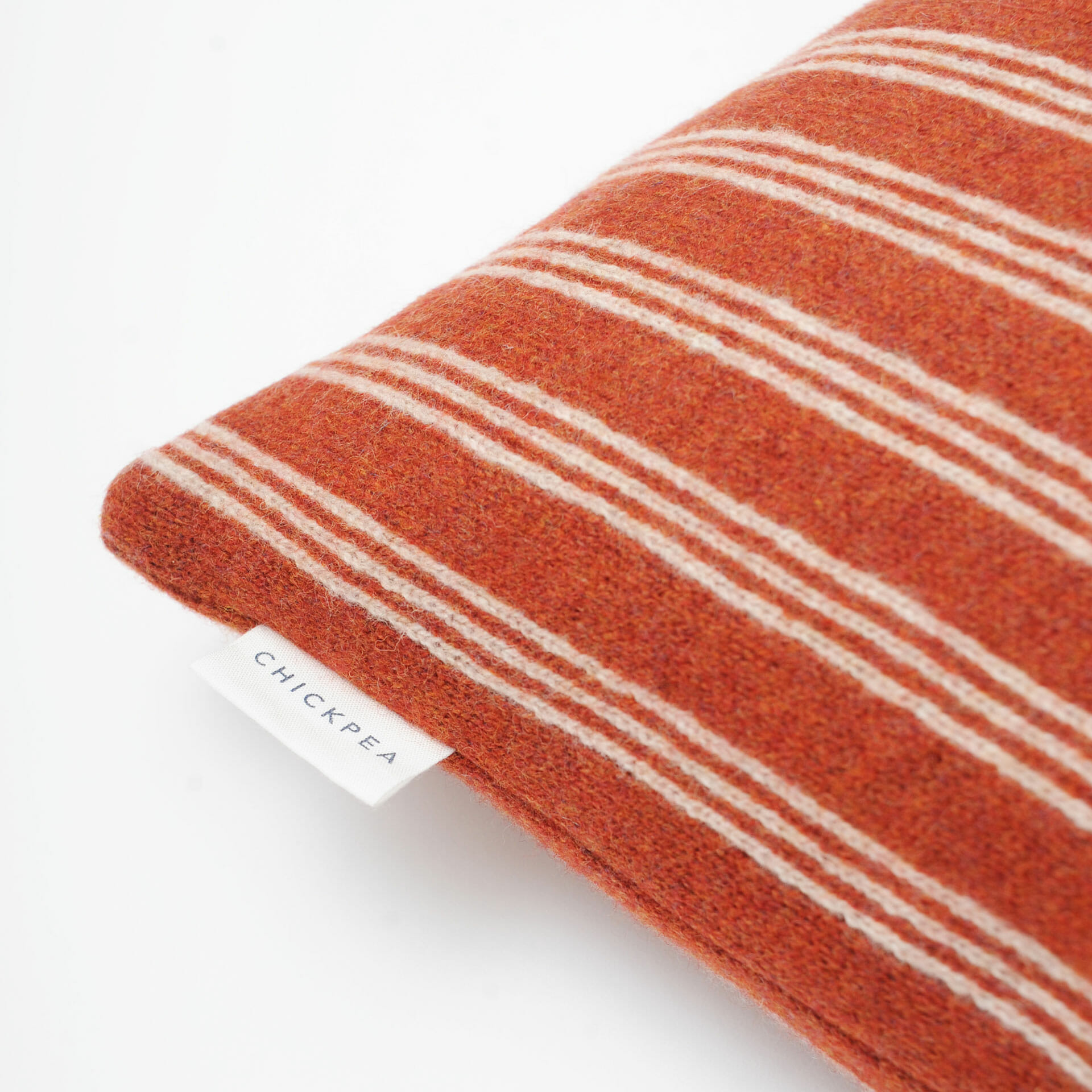 rust-ticking-stripe-cushion
